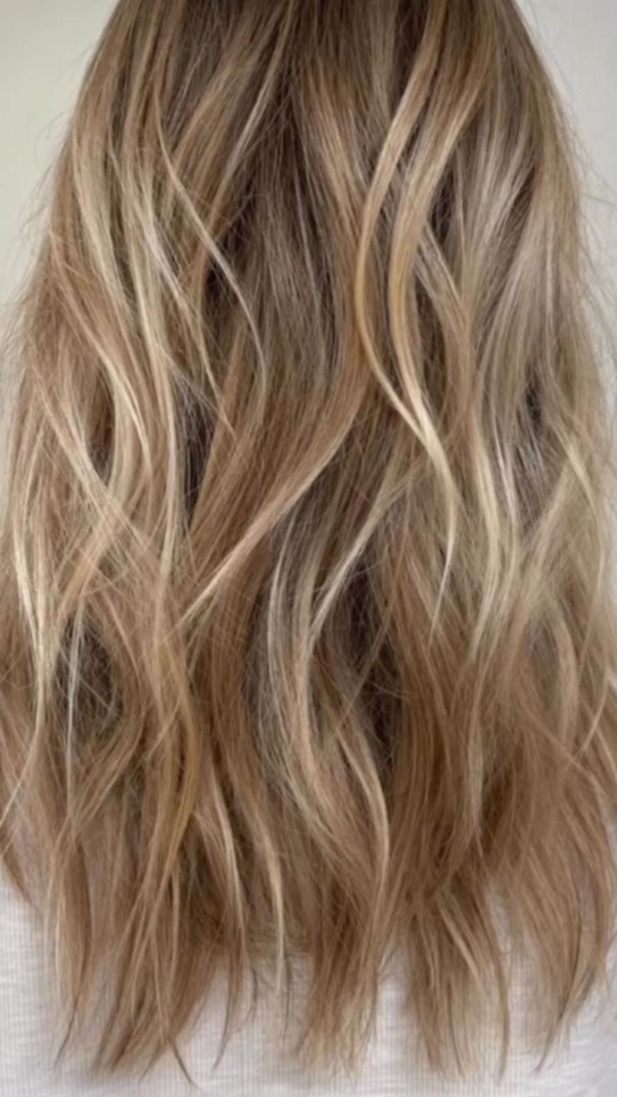 Balayage color inspiration in warm natural light